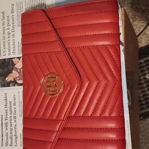 Brand new Mischka quilting center crossbody